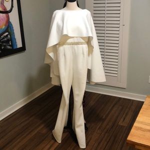White jumpsuit with cape